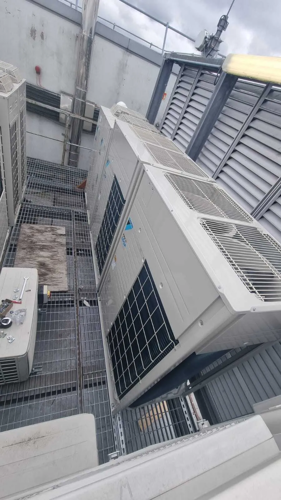 Daikin outdoor units on a rooftop plant deck