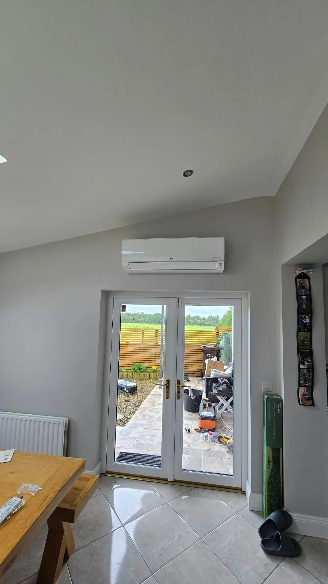 Air conditioner above patio doors in a kitchen extension