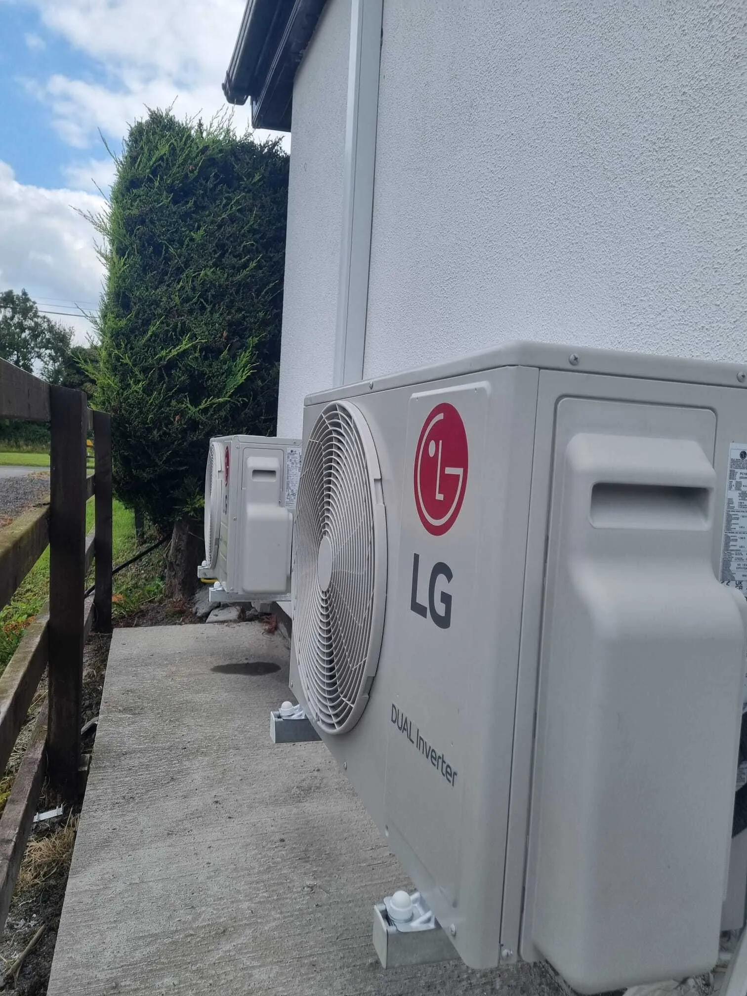 LG outdoor unit installed on the side of a house
