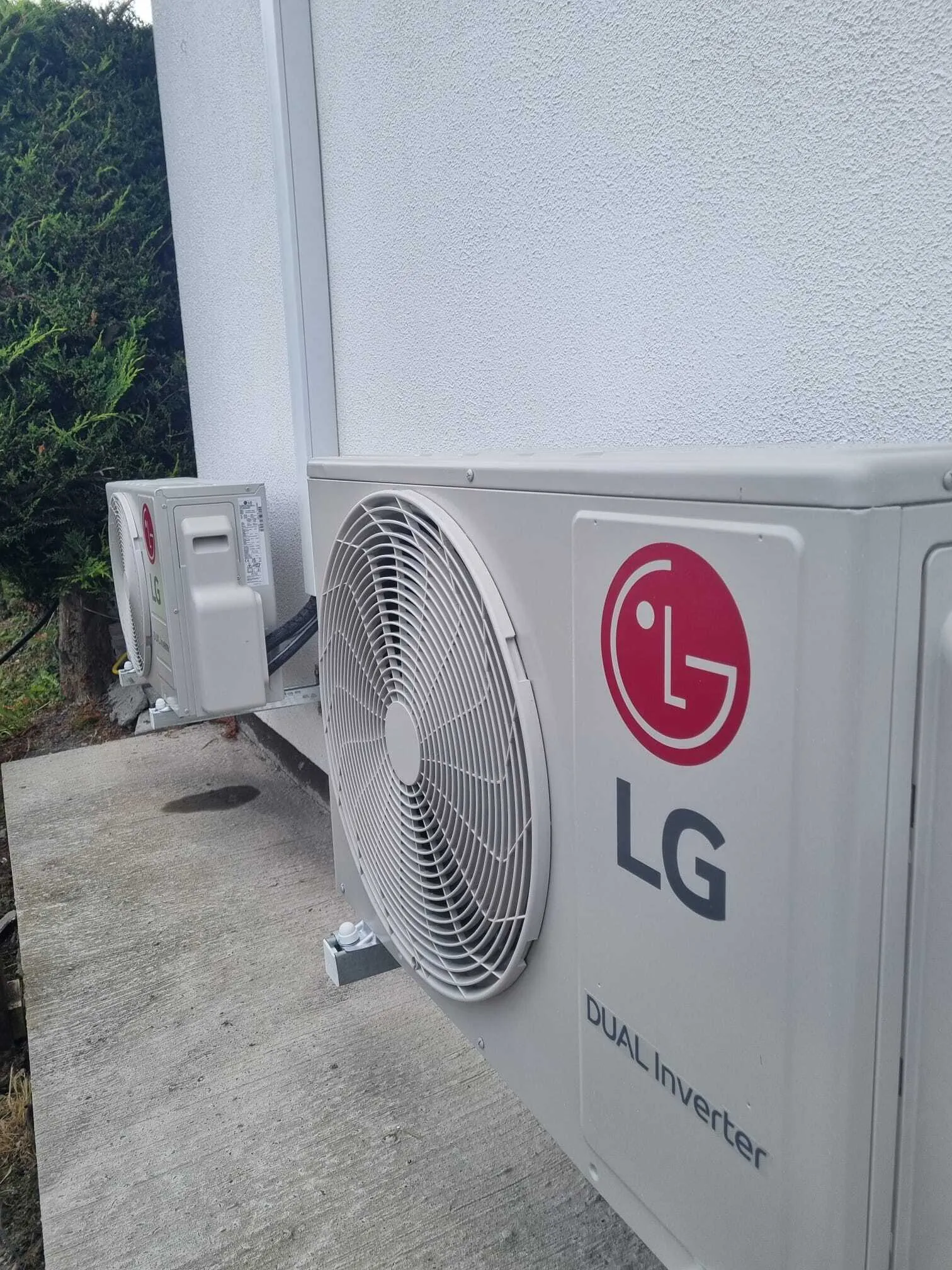 LG Dual Inverter outdoor units mounted on an exterior wall