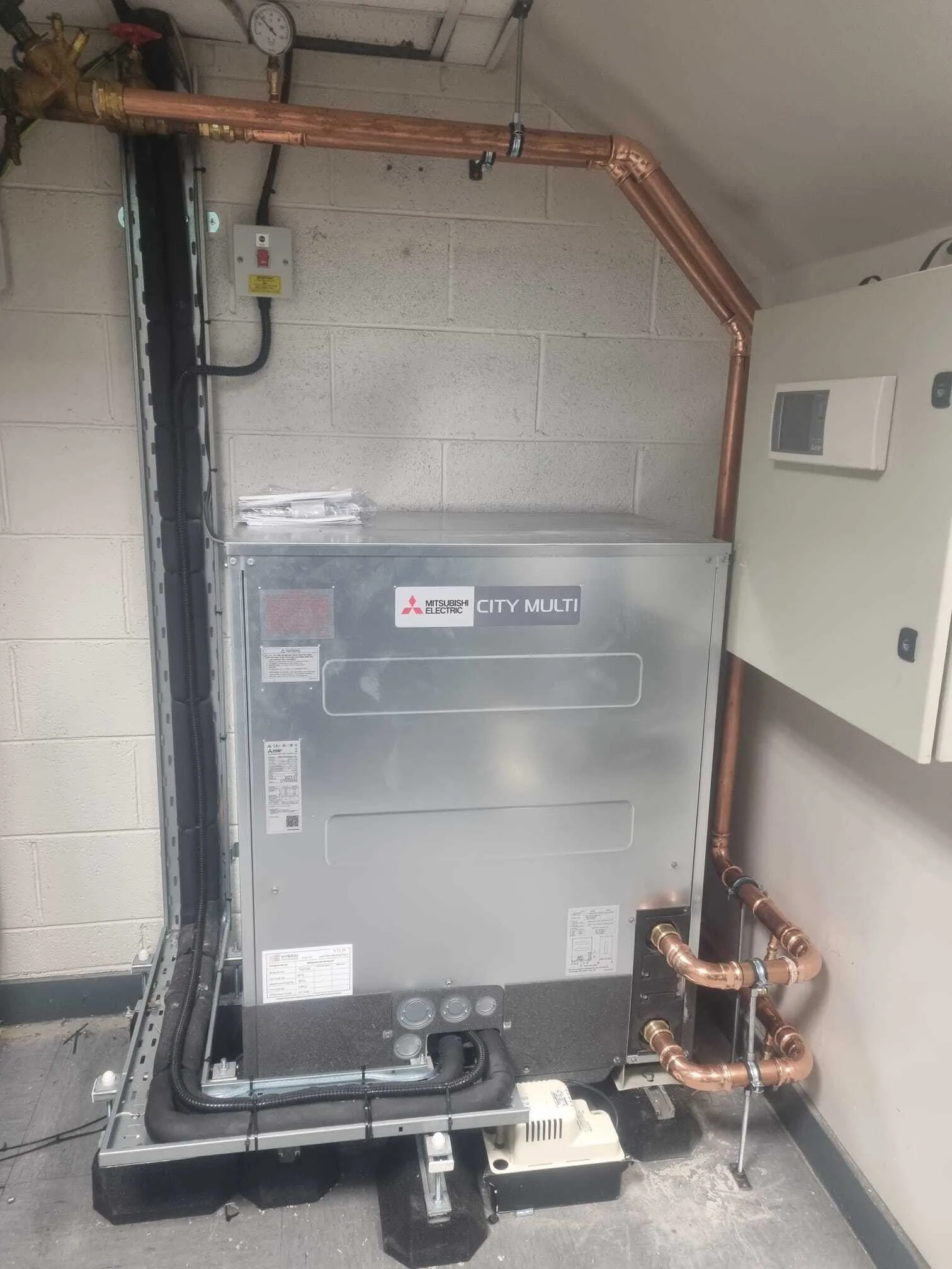 Mitsubishi City Multi unit with copper pipework in a plant room