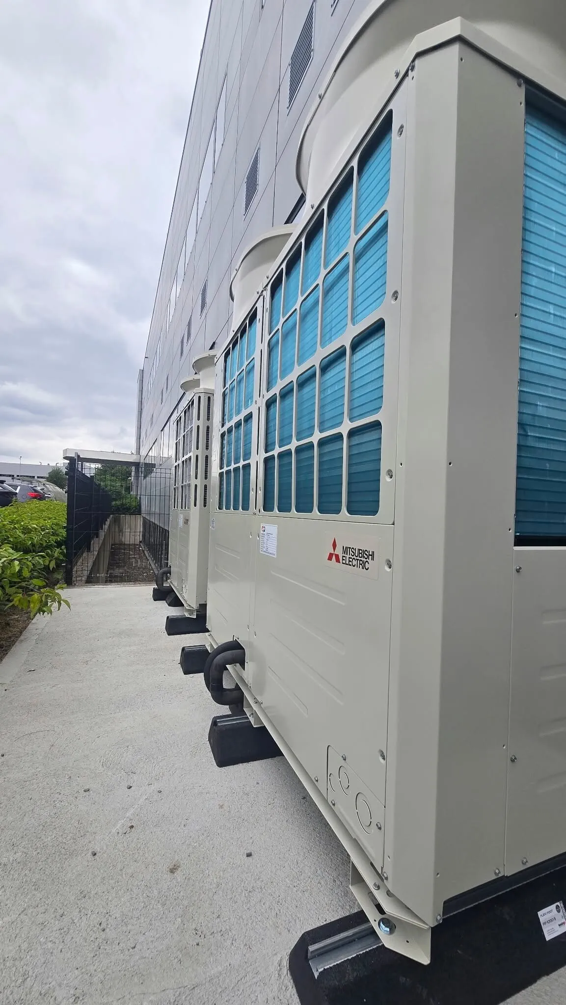 Row of Mitsubishi VRF outdoor units