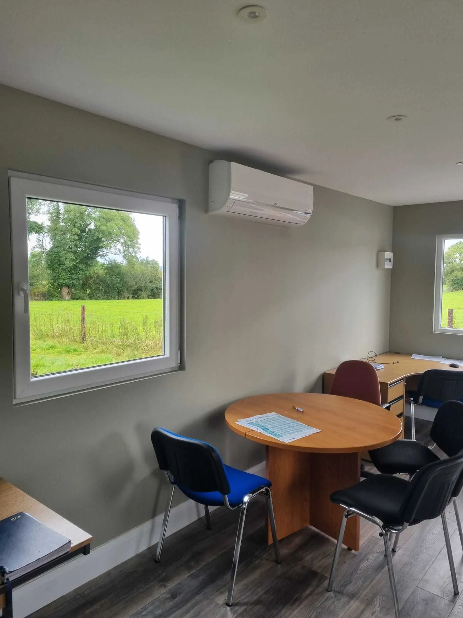 Split system air conditioning unit in an office