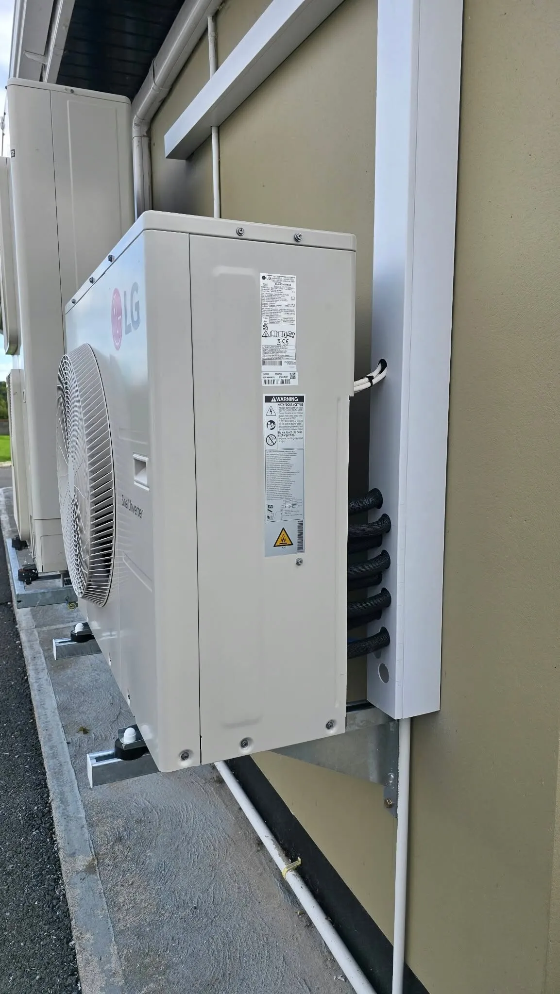 Outdoor unit on a wall bracket